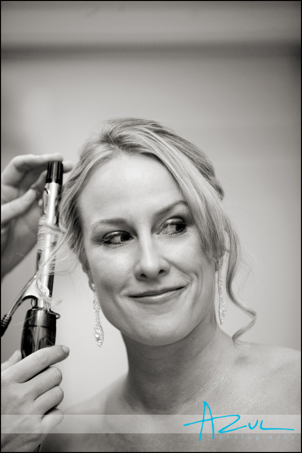 Jenna smiles for her photograph while getting ready before her Wilson wedding