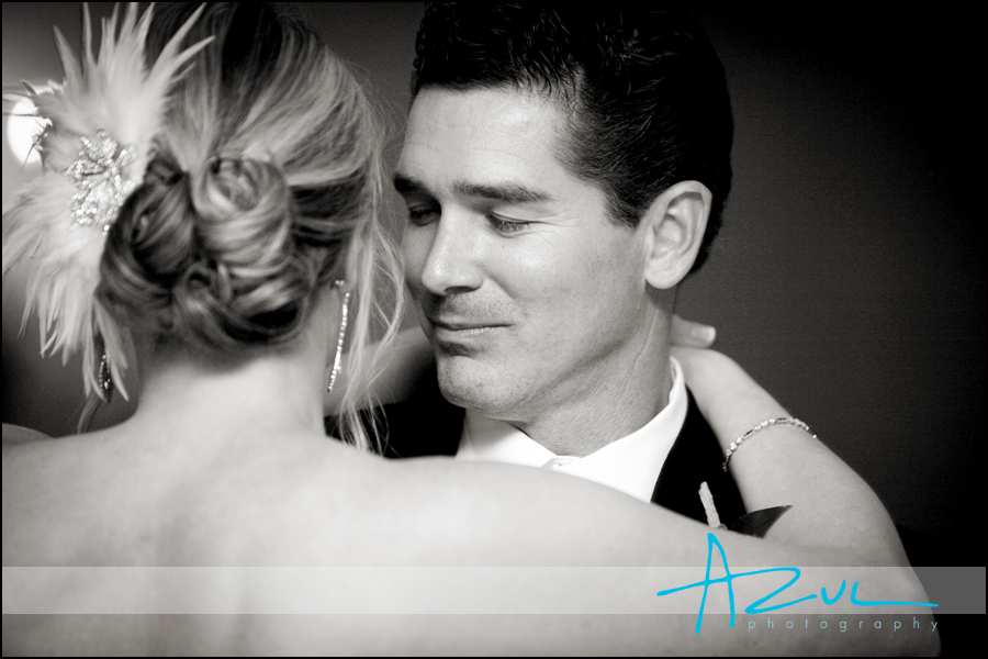 The groom looks into the eyes of his bride during the first dance.