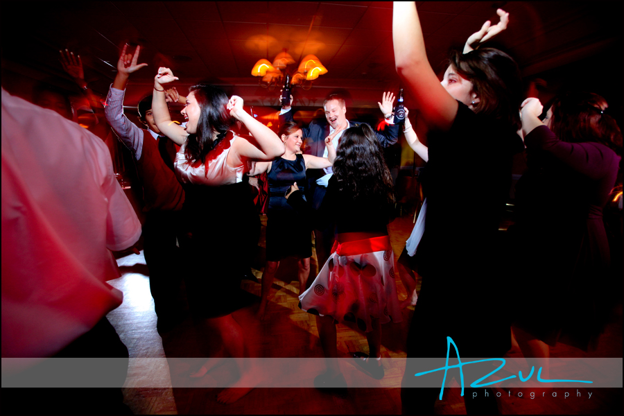 The crowd fills the dancefloor at the wedding reception at the country club in Wilson.